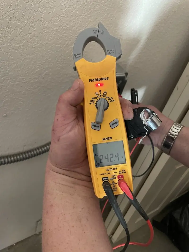 Voltage testing with clamp meter during Aluminum Wiring Replacement in Redmond
